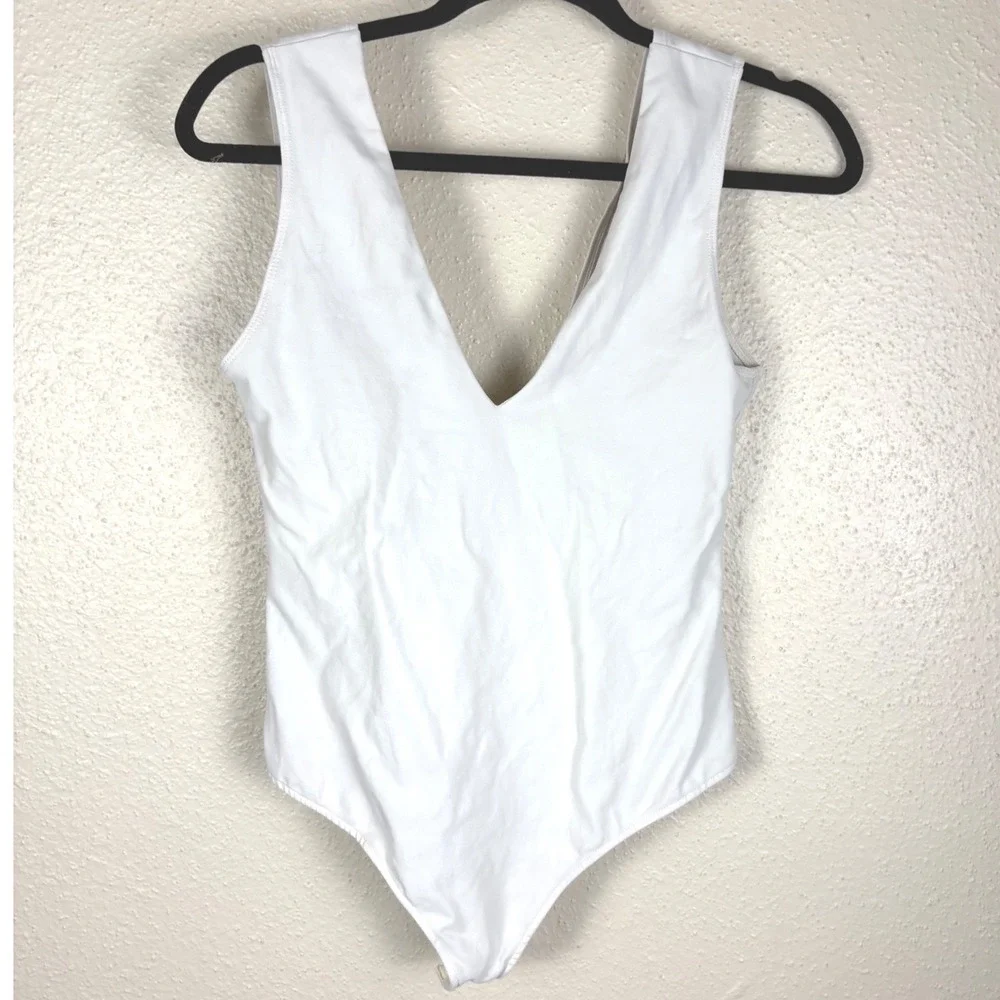 Free People Keep It Sleek White V-Neck Thong Bodysuit Size M Sleeveless Top
